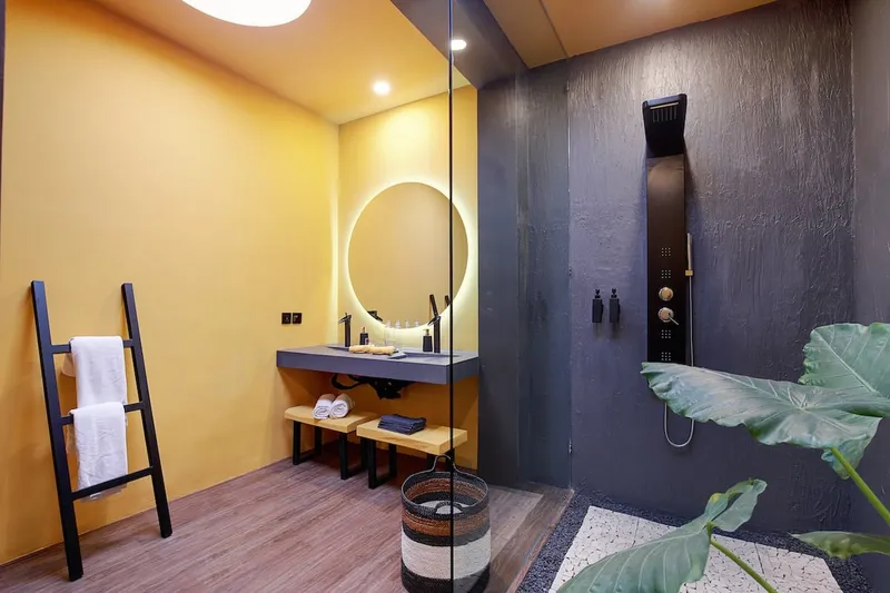 1 our of 4 ensuite bathrooms with walk-in shower and amenities like soap, shampoo, body foam are provided