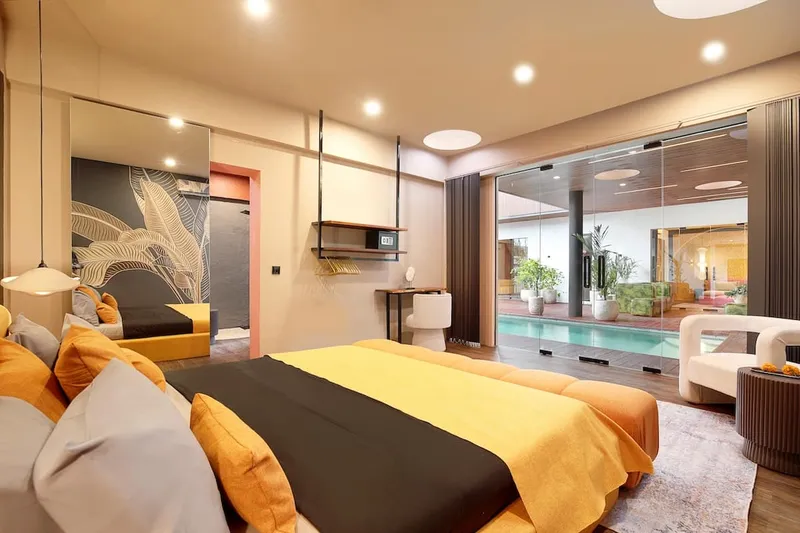 Master bedroom with pool access, AC, Safe and en suite walking shower bathroom