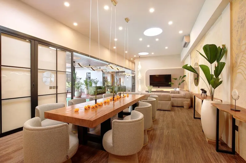 Perfect for quality time—relax with family and friends in an airy living room with view to the pool