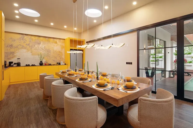 Spacious dining area for up to 12 guests with easy kitchen access.