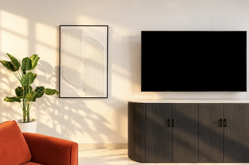 Zephyr living room TV wall with black fluted console and line-art print
